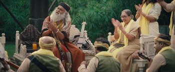 Movie still from “Khufiya” (2023), directed by Vishal Bhardwaj – A man and a woman sitting next to each other; Wide shot, Over the shoulder angle