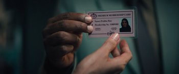 Movie still from “Khufiya” (2023), directed by Vishal Bhardwaj – A person holding a membership card in their hand; Extreme Close Up shot, Overhead angle