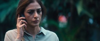 Movie still from “Khufiya” (2023), directed by Vishal Bhardwaj – A person wearing a gray shirt; Close Up shot, Over the shoulder angle