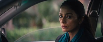 Movie still from “Khufiya” (2023), directed by Vishal Bhardwaj – A person sitting in a car; Close Up shot, Over the shoulder angle