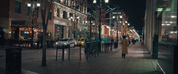 Movie still from “Khufiya” (2023), directed by Vishal Bhardwaj – A city street at night lit up by street lights; Extreme Wide shot, High angle