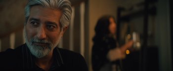 Movie still from “Khufiya” (2023), directed by Vishal Bhardwaj – A man with a gray beard and white hair; Close Up shot, Over the shoulder angle