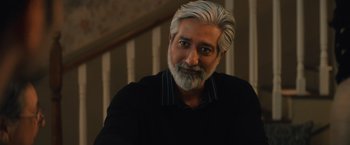 Movie still from “Khufiya” (2023), directed by Vishal Bhardwaj – A person wearing a black shirt; Close Up shot, Over the shoulder angle