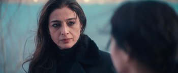 Movie still from “Khufiya” (2023), directed by Vishal Bhardwaj – A person wearing a jacket; Close Up shot, Over the shoulder angle