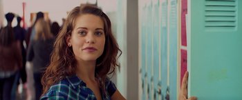 Movie still from “Kick-Ass” (2010), directed by Matthew Vaughn – A person wearing a plaid shirt; Close Up shot, Over the shoulder angle