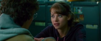 Movie still from “Kick-Ass” (2010), directed by Matthew Vaughn – A woman sitting in front of another woman; Close Up shot, Over the shoulder angle