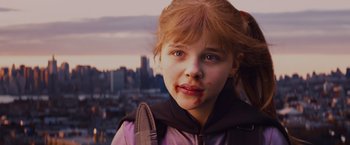 Movie still from “Kick-Ass” (2010), directed by Matthew Vaughn – A young girl with blood all over her face; Close Up shot, Low angle