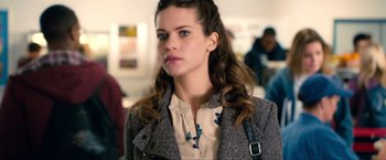 Movie still from “Kick-Ass 2” (2013), directed by Jeff Wadlow – A person wearing a jacket; Close Up shot, Over the shoulder angle