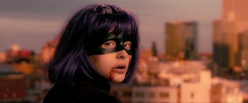 Movie still from “Kick-Ass 2” (2013), directed by Jeff Wadlow – A person wearing a mask; Close Up shot, Over the shoulder angle