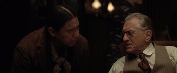 Movie still from “Killers of the Flower Moon” (2023), directed by Martin Scorsese – A man and a woman talking to each other; Close Up shot, Over the shoulder angle