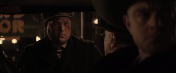 Movie still from “Killers of the Flower Moon” (2023), directed by Martin Scorsese – An old man looking at himself in the mirror; Medium shot, Over the shoulder angle