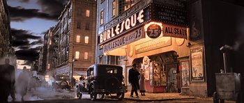 Movie still from “King Kong” (2005), directed by Peter Jackson – A couple of people walking down a street; Wide shot, High angle