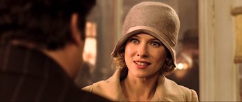 Movie still from “King Kong” (2005), directed by Peter Jackson – A person wearing a hat; Close Up shot, Over the shoulder angle