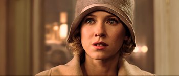 Movie still from “King Kong” (2005), directed by Peter Jackson – A person wearing a hat; Close Up shot, Over the shoulder angle