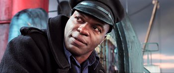 Movie still from “King Kong” (2005), directed by Peter Jackson – A person wearing a hat; Close Up shot, Low angle