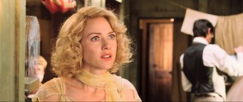 Movie still from “King Kong” (2005), directed by Peter Jackson – A person with blonde curly hair; Close Up shot, Low angle