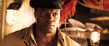 Movie still from “King Kong” (2005), directed by Peter Jackson – A person wearing a hat; Close Up shot, Low angle
