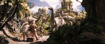 Movie still from “King Kong” (2005), directed by Peter Jackson – A group of dinosaurs in the middle of a jungle; Extreme Wide shot, Low angle