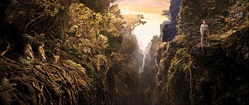 Movie still from “King Kong” (2005), directed by Peter Jackson – A painting of a valley with trees and a waterfall; Extreme Wide shot, Overhead angle
