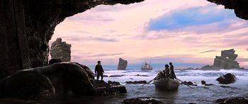 Movie still from “King Kong” (2005), directed by Peter Jackson – A group of people on a boat in the water; Extreme Wide shot, High angle