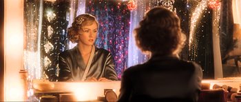 Movie still from “King Kong” (2005), directed by Peter Jackson – A woman sitting in front of a mirror in front of a mirror; Close Up shot, Over the shoulder angle
