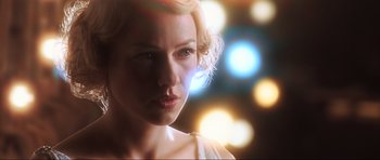 Movie still from “King Kong” (2005), directed by Peter Jackson – A beautiful woman with blonde hair looking at the camera; Close Up shot, Over the shoulder angle