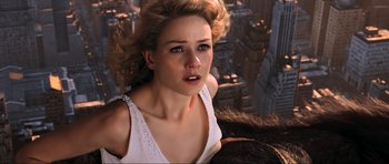 Movie still from “King Kong” (2005), directed by Peter Jackson – A beautiful woman with blonde hair and blue eyes looking sad; Close Up shot, Overhead angle