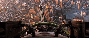 Movie still from “King Kong” (2005), directed by Peter Jackson – A view of a city from the top of an amusement ride; Extreme Wide shot, Overhead angle