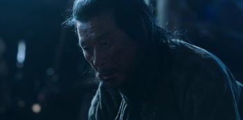 Movie still from “Kingdom: Ashin of the North” (2021), directed by Kim Seong-hun – A person with long black hair; Close Up shot, Low angle
