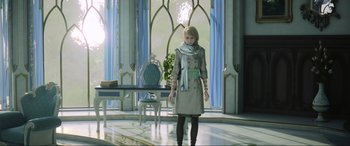Movie still from “Kingsglaive: Final Fantasy XV” (2016), directed by Takeshi Nozue – A woman in a trench coat and scarf in a room; Wide shot, Over the shoulder angle