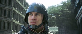 Movie still from “Kingsglaive: Final Fantasy XV” (2016), directed by Takeshi Nozue – A person wearing a helmet; Close Up shot, Low angle