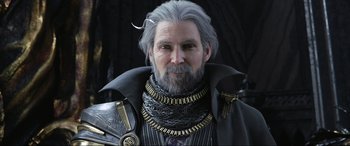 Movie still from “Kingsglaive: Final Fantasy XV” (2016), directed by Takeshi Nozue – An old man with a beard and a long gray beard; Close Up shot, Over the shoulder angle