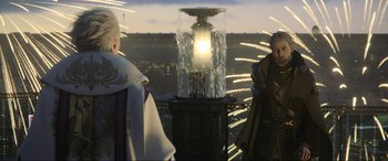 Movie still from “Kingsglaive: Final Fantasy XV” (2016), directed by Takeshi Nozue – Two people standing in front of a fountain with fireworks in the background; Medium shot, Over the shoulder angle