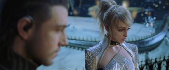 Movie still from “Kingsglaive: Final Fantasy XV” (2016), directed by Takeshi Nozue – A man and a woman are standing next to each other; Close Up shot, Over the shoulder angle
