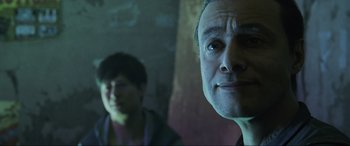 Movie still from “Kingsglaive: Final Fantasy XV” (2016), directed by Takeshi Nozue – A man and a woman looking at the camera; Close Up shot, Over the shoulder angle