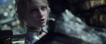 Movie still from “Kingsglaive: Final Fantasy XV” (2016), directed by Takeshi Nozue – A person with short blonde hair; Close Up shot, Over the shoulder angle
