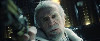 Movie still from “Kingsglaive: Final Fantasy XV” (2016), directed by Takeshi Nozue – An old man with a white beard is looking at the camera; Close Up shot, Low angle