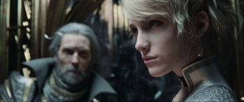 Movie still from “Kingsglaive: Final Fantasy XV” (2016), directed by Takeshi Nozue – A man and a woman looking into a mirror; Close Up shot, Over the shoulder angle