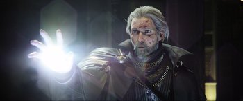 Movie still from “Kingsglaive: Final Fantasy XV” (2016), directed by Takeshi Nozue – An old man with a beard is holding a sword; Close Up shot, Over the shoulder angle