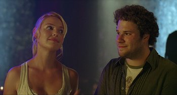 Movie still from “Knocked Up” (2007), directed by Judd Apatow – A man and a woman standing next to each other; Close Up shot, Over the shoulder angle