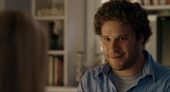 Movie still from “Knocked Up” (2007), directed by Judd Apatow – A person with curly hair; Close Up shot, Over the shoulder angle