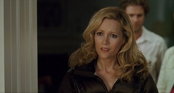 Movie still from “Knocked Up” (2007), directed by Judd Apatow – A person with long hair; Close Up shot, Over the shoulder angle
