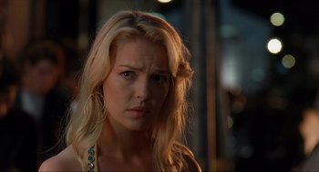 Movie still from “Knocked Up” (2007), directed by Judd Apatow – A beautiful blonde woman with a serious look; Close Up shot, Over the shoulder angle