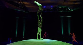 Movie still from “Knocked Up” (2007), directed by Judd Apatow – A couple of people that are doing a trick in the air; Wide shot, Low angle