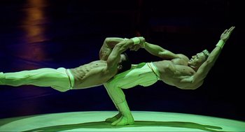 Movie still from “Knocked Up” (2007), directed by Judd Apatow – A couple of people that are doing some kind of acrobatic trick; Wide shot, Low angle