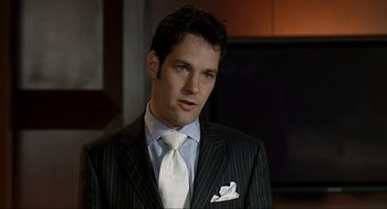 Movie still from “Knocked Up” (2007), directed by Judd Apatow – A man in a suit and tie looking to his left; Close Up shot, Low angle