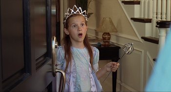 Movie still from “Knocked Up” (2007), directed by Judd Apatow – A little girl dressed up as a princess holding a wand; Close Up shot, High angle