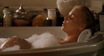 Movie still from “Knocked Up” (2007), directed by Judd Apatow – A woman taking a bubble bath in a bath tub; Close Up shot, High angle