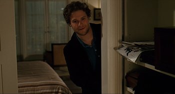 Movie still from “Knocked Up” (2007), directed by Judd Apatow – A man standing at the door of a room; Medium shot, Over the shoulder angle