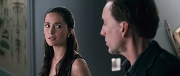 Movie still from “Knowing” (2009), directed by Alex Proyas – A man and a woman are looking at one another; Close Up shot, Over the shoulder angle